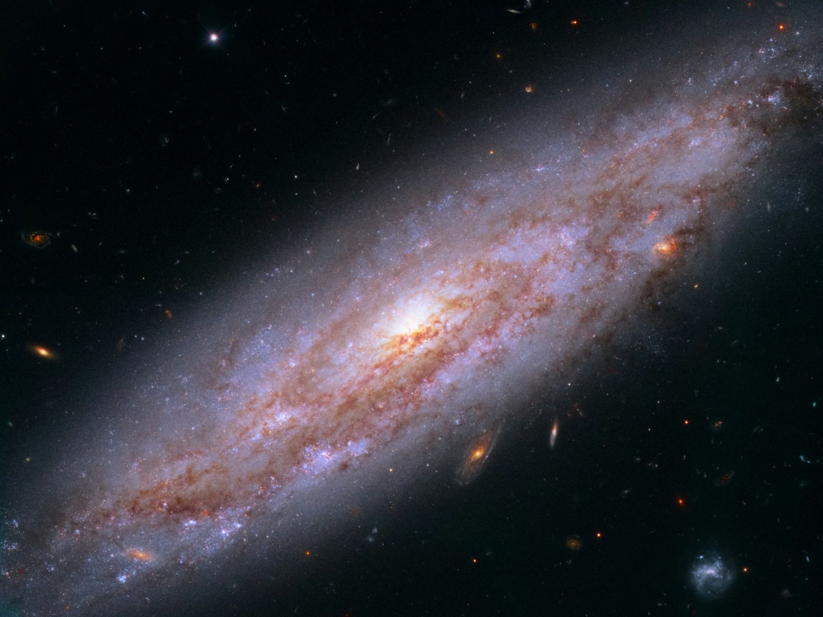 M88’s Elegant Spiral Could Not Last, A Close Encounter May Strip Away Its Star-Making Gas