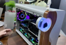 A MicroATX Case That Moves With Ferrofluid, Turning A Desk Into A Strange Display Piece